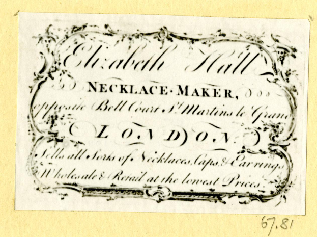 Eine alte Visitenkarte mit einem Bild eines Schmuckherstellers und Text, der dessen Dienstleistungen beschreibt.