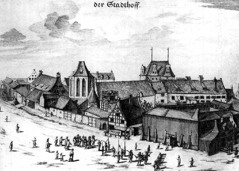 Schwarze und weiße Zeichnung einer deutschen Stadtstraße aus dem 18. Jahrhundert mit Fußgängern, Gebäuden und Wolken, beschriftet mit "Stadthoff, Deutschland 1775."