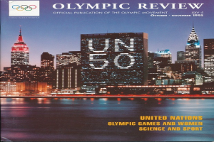 Buch mit dem Titel "Olympische Revue Offizielle Veröffentlichung der Olympischen Bewegung" mit einer Stadtansicht auf dem Cover, das auf einer flachen Oberfläche liegt.