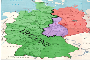 Ein Plakat, das eine Deutschlandkarte mit den Trizonen-Provinzen in verschiedenen Farben und begleitendem Text zeigt.