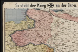 Ein gerahmtes Deutschland-Karte mit der Aufschrift "So Steht der Krieg an der Ost-U".